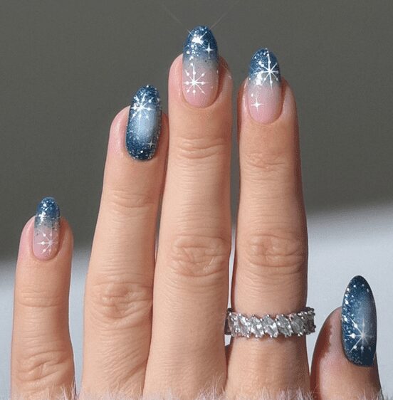 French manicure with glitter tips and snowflake nail art