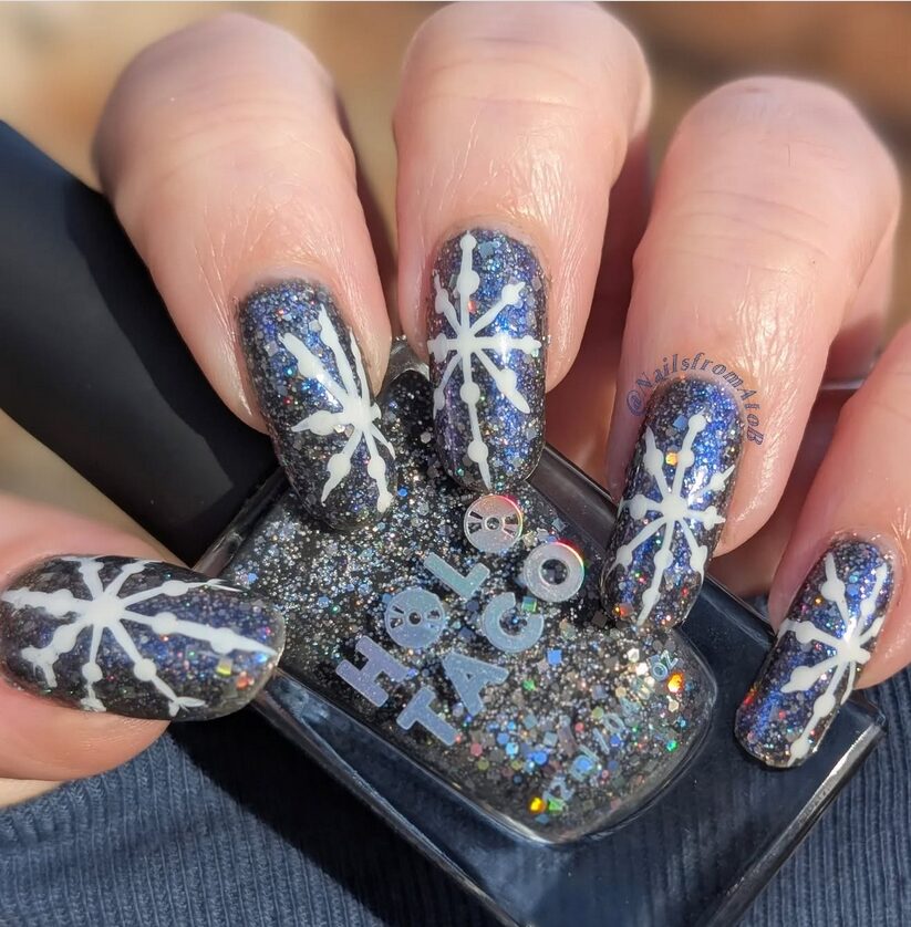 Holographic snowflake nail stickers on nude nails