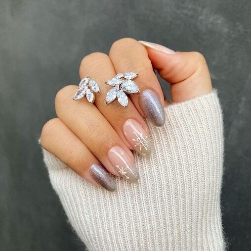 Chrome silver nails with snowflake designs
