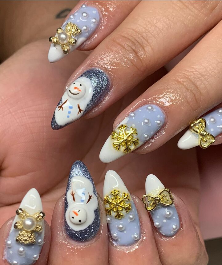 Glittery winter landscape nails with snowmen