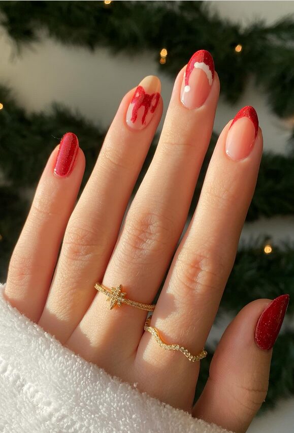 nails with snowmen wearing red Santa hats
