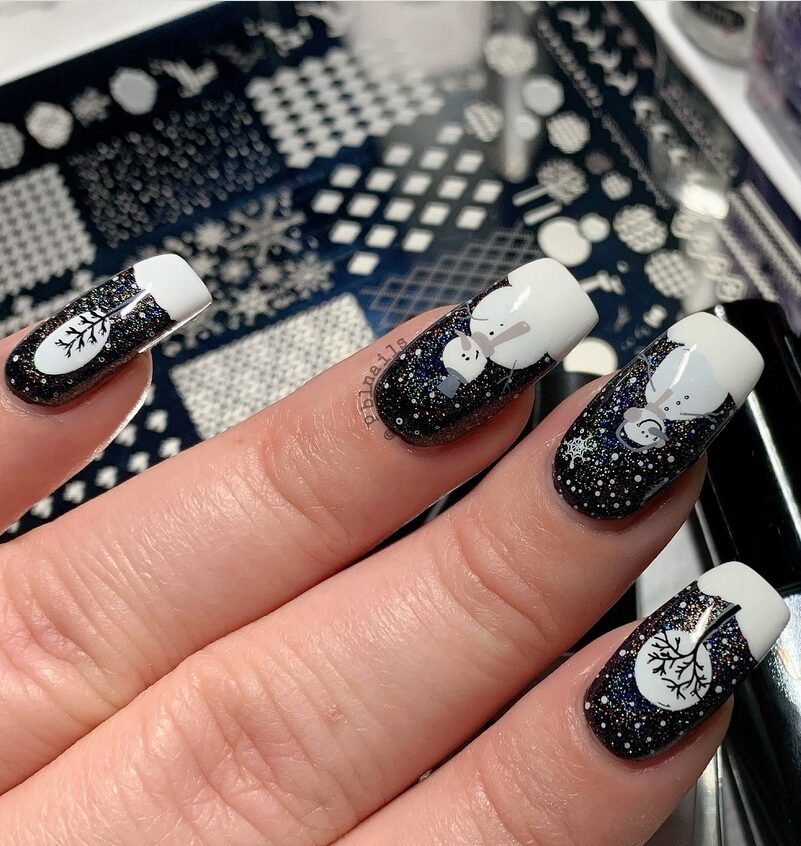 Black-and-white nails with snowman art