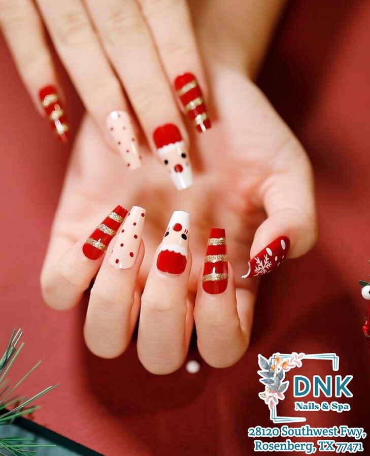 Negative space nails with minimalist snowman art