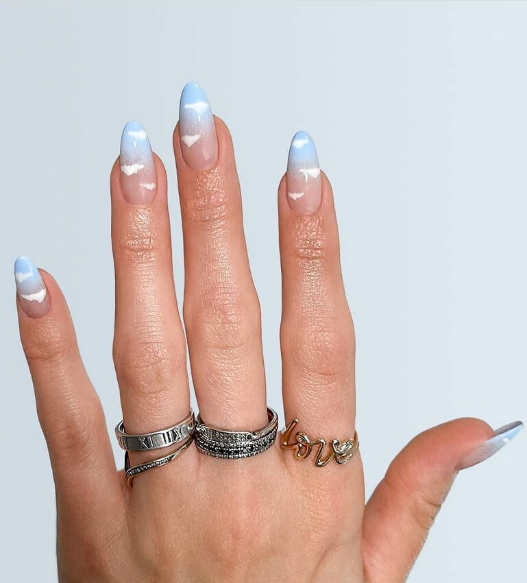 white nail ideas with cloud art