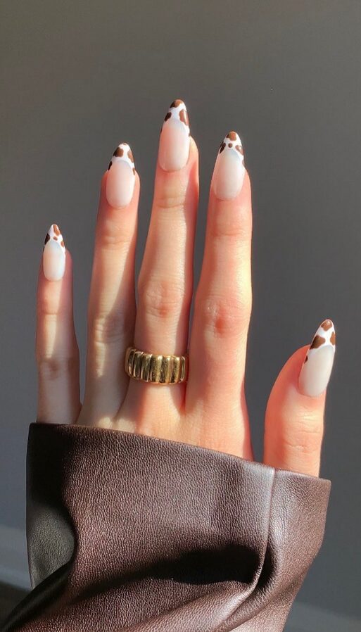 white nails with cow prints