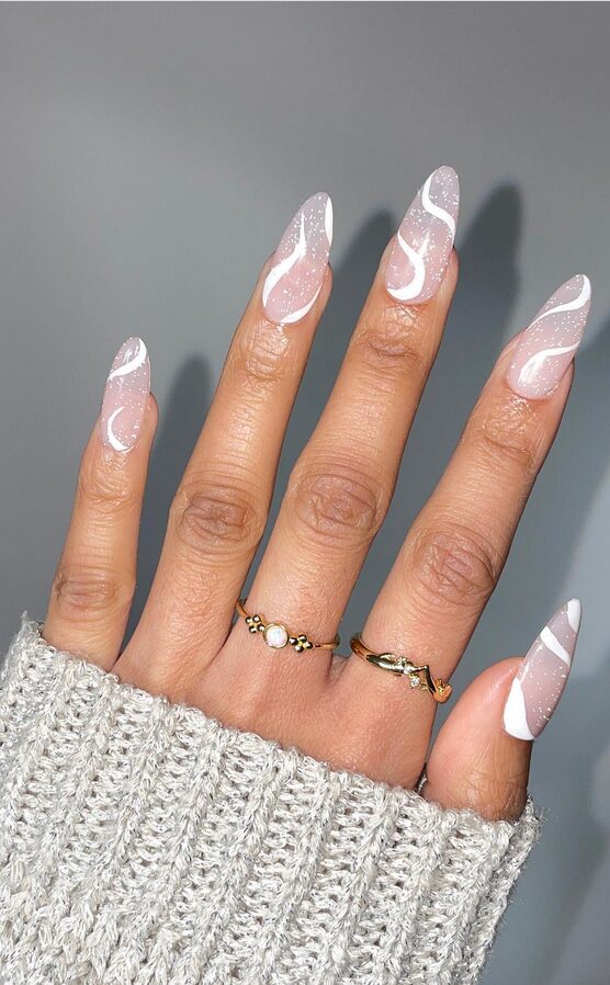White sparkle swirls nails upclose