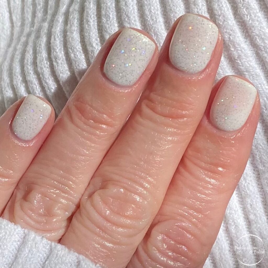 Artic White Shimmer nails topped with Scattered Holo Taco