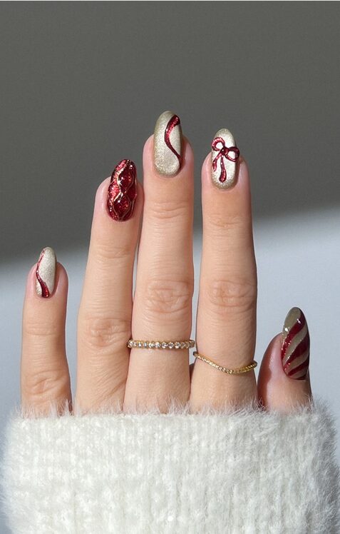 Rich red velvet nails with bow artwork