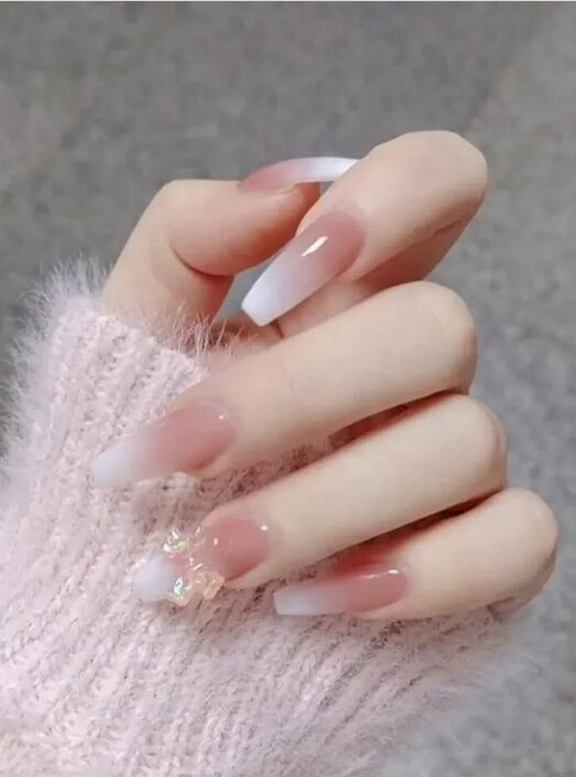 white ombre nails with 3d bow