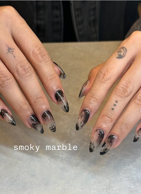 Smoky marble grunge nails with gray and black swirl designs