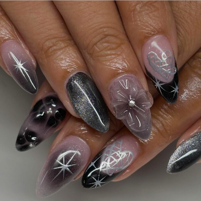 Black nails with distressed silver glitter overlay