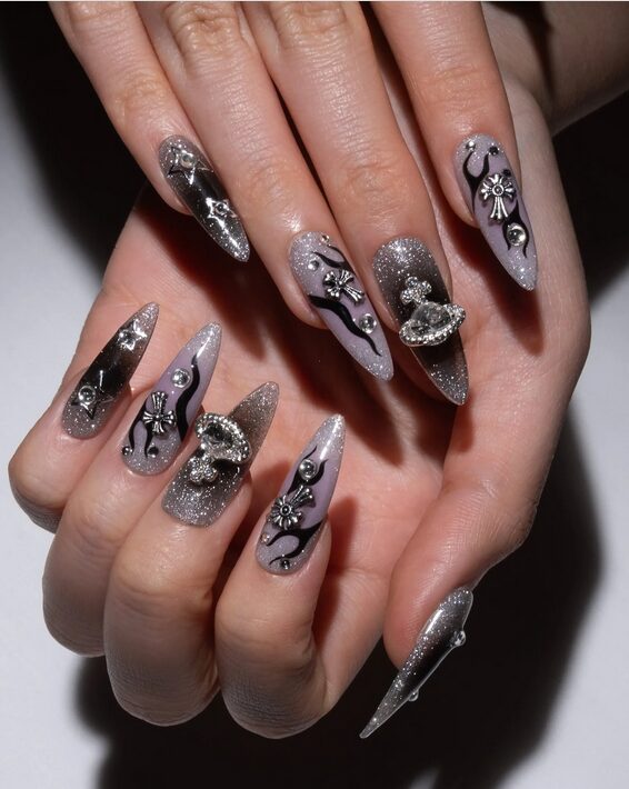 nails with silver studs and chain accents