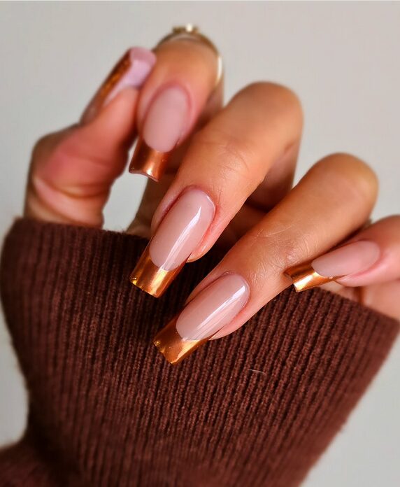 Copper and burnt orange nails