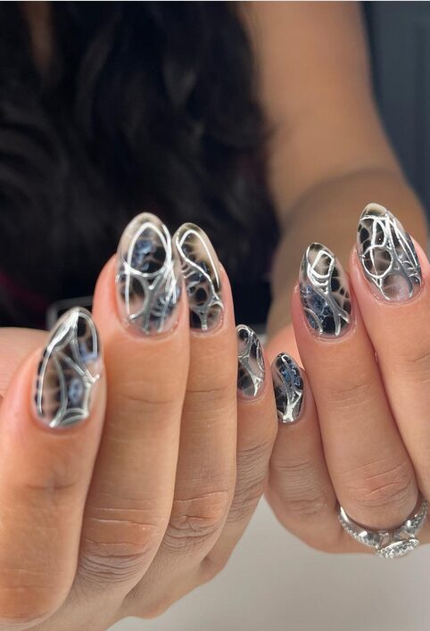 Black nails with broken glass foil effect