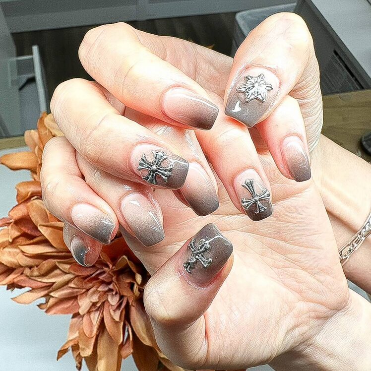 Grey ombre nails transitioning to light tones