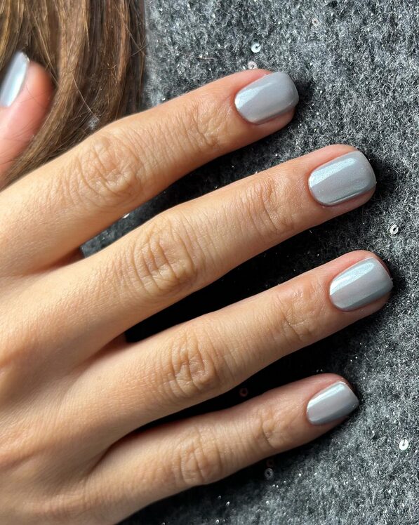 Pearl grey nails with subtle shimmer and elegant shine.