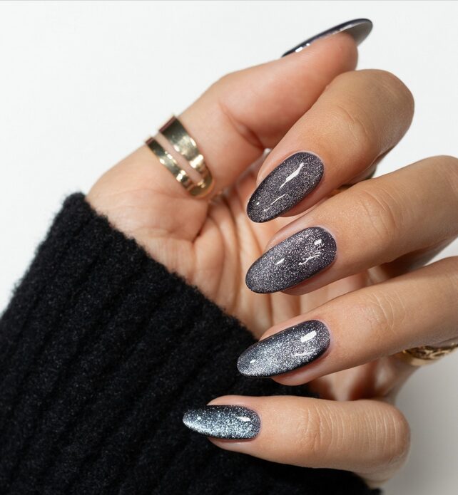Velvet grey nails with cat-eye shimmer effect.
