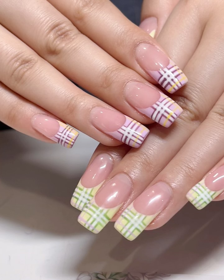 french tip manicure with plaids