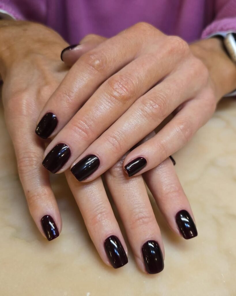 mahogany-toned maroons and almost-black manicure