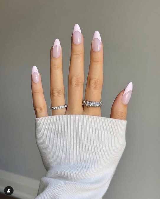 almond-shaped baby pink nails with soft French tip design