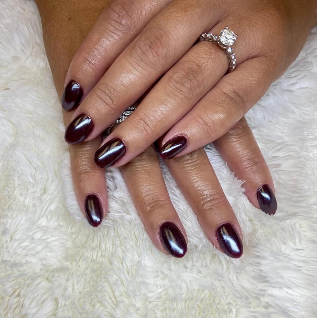 Burgundy chrome manicure