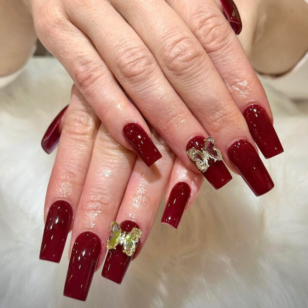 Burgundy nails with Rhinestones