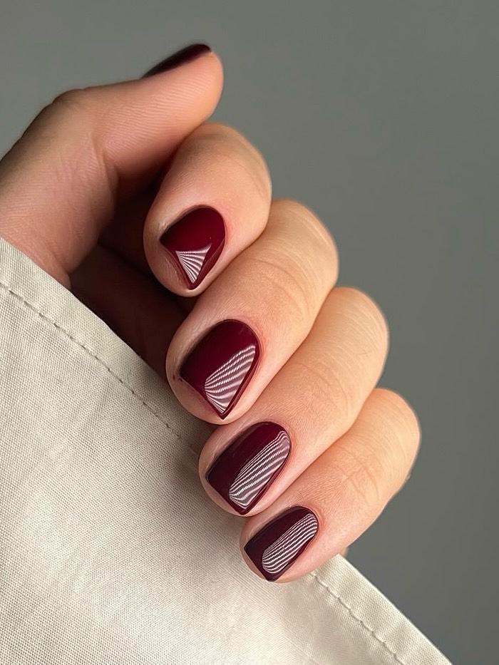 chevron nails with burgundy nail polish
