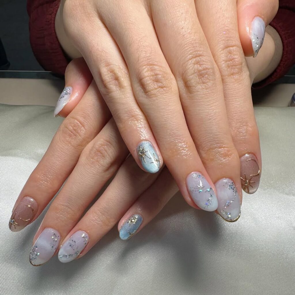 pastel nails with glitter accents