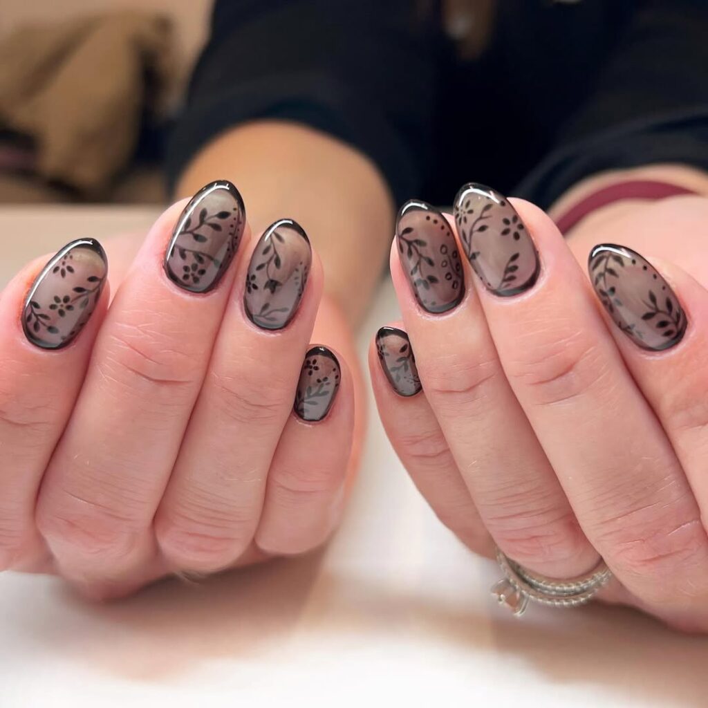 glass black nails with delicate botanical vine details