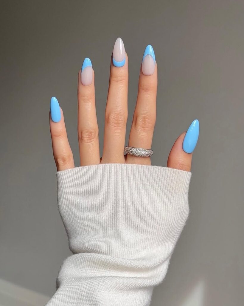 nails with sky blue French tips and glossy finish
