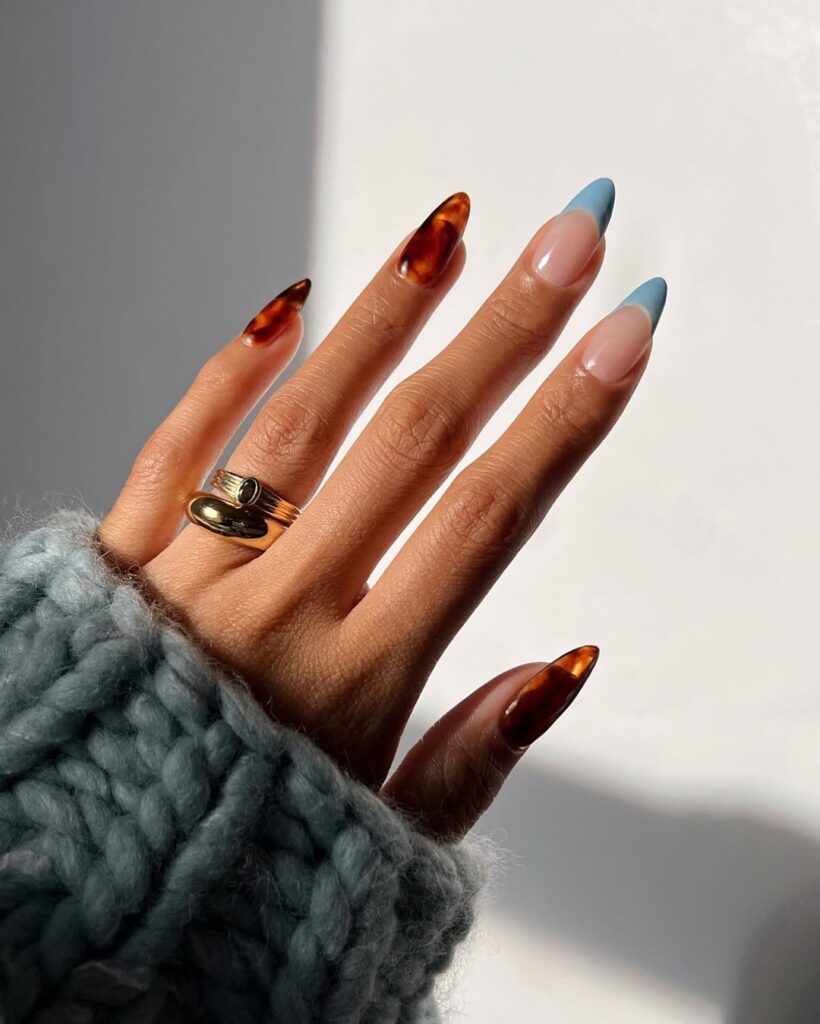 tortoise and blue french tip nails combo