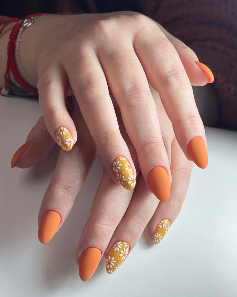 orange and mustard daisy nails