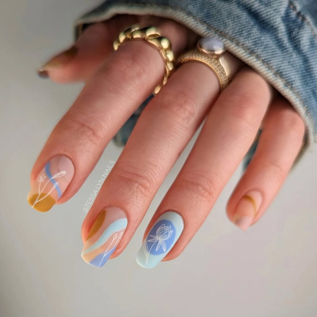 abstract blue orange and gold floral nails