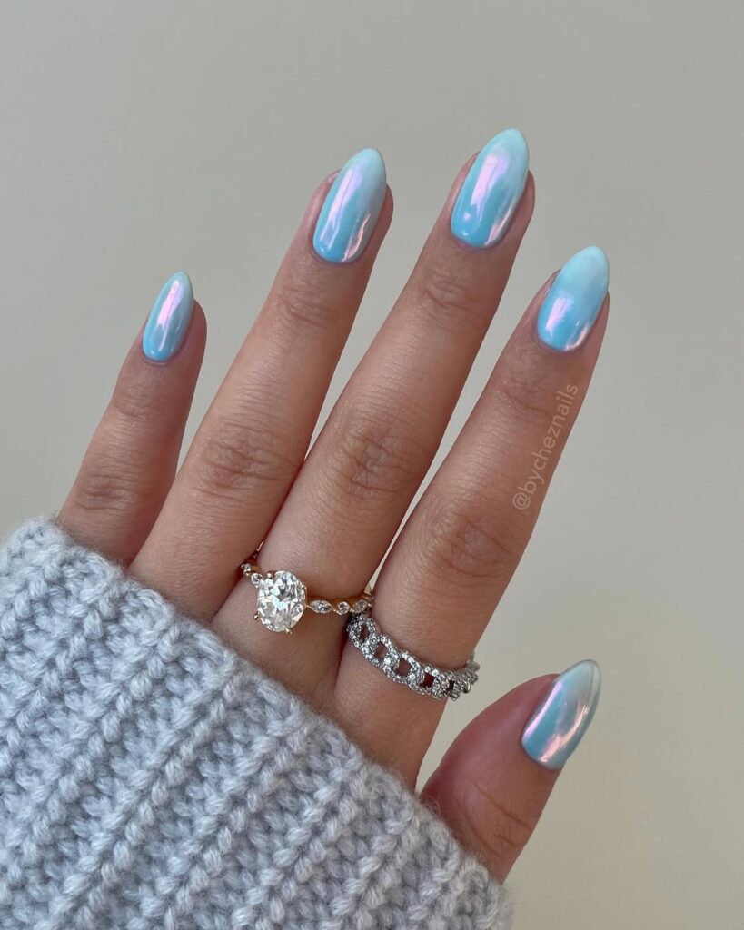 Medium nails in baby blue chrome with pink iridescent shift
