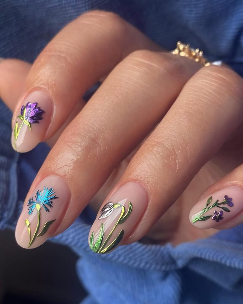 Short oval nude nails with metallic chrome botanical flower line art