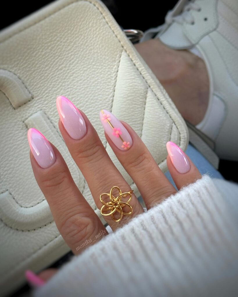 glazed pink nails with a 3D pink flower on gold stem accent nail