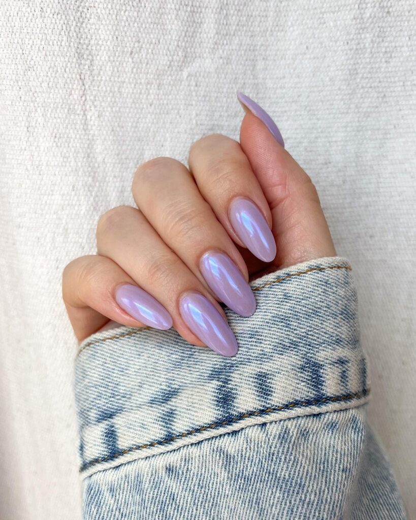 nails in soft lavender with a pearlescent chrome finish