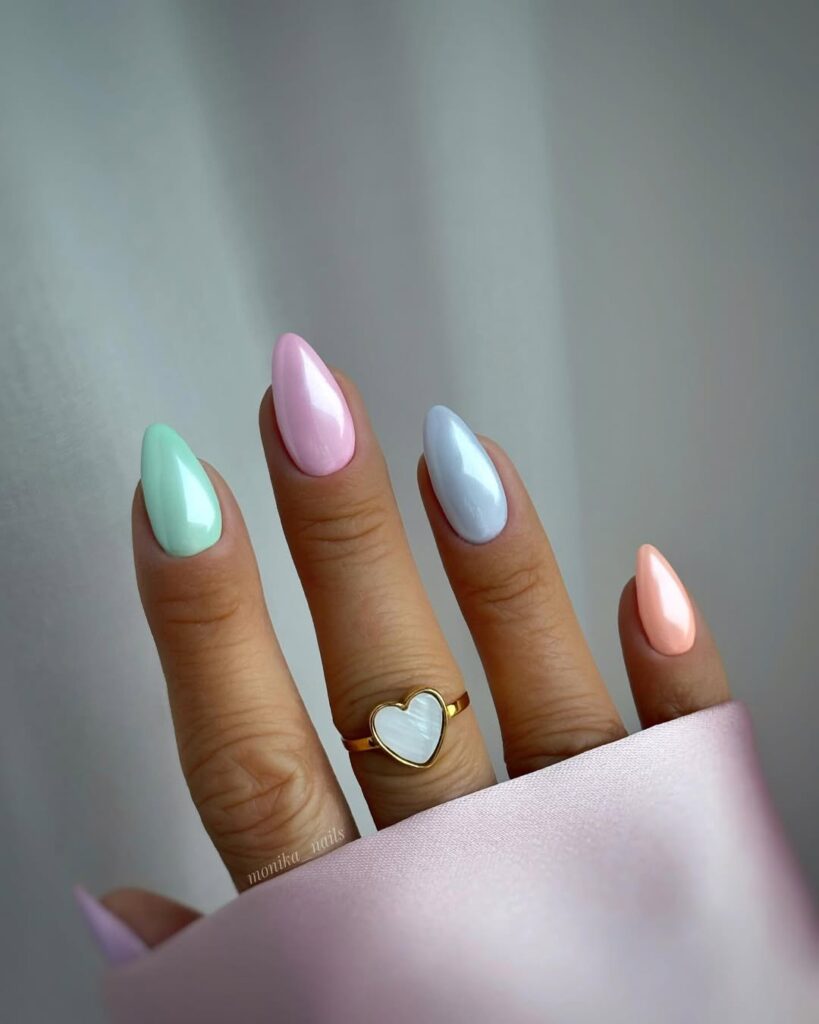 nails in individual pastel chrome shades — mint, pink, blue and peach