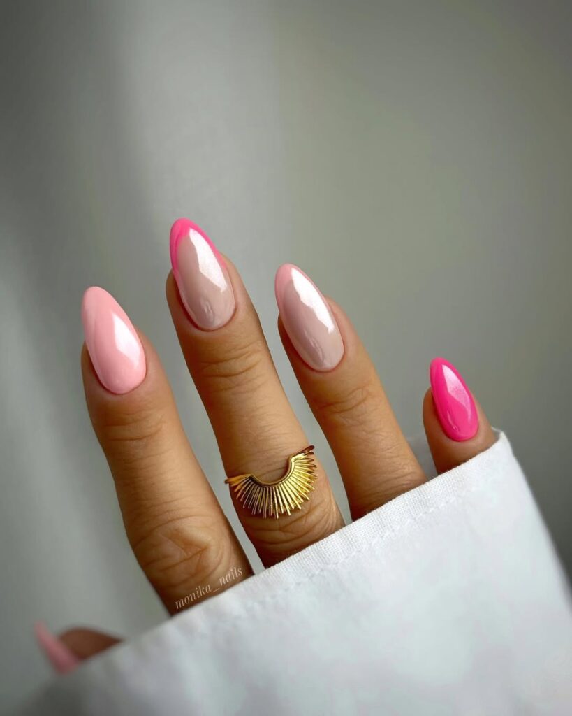 Almond nails in nude pink chrome ombre with hot pink accent nails