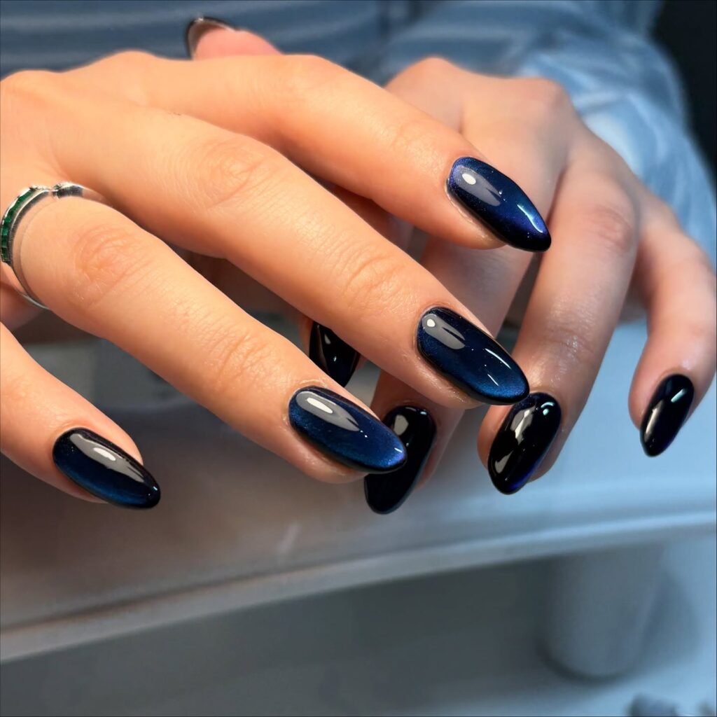 Deep navy teal aquamarine cat eye nails