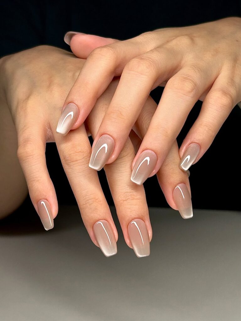 Translucent beige coffin cat eye nails