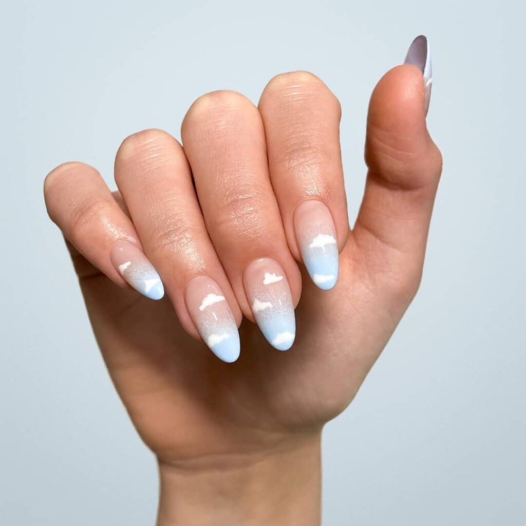 Baby blue cloud nail art design