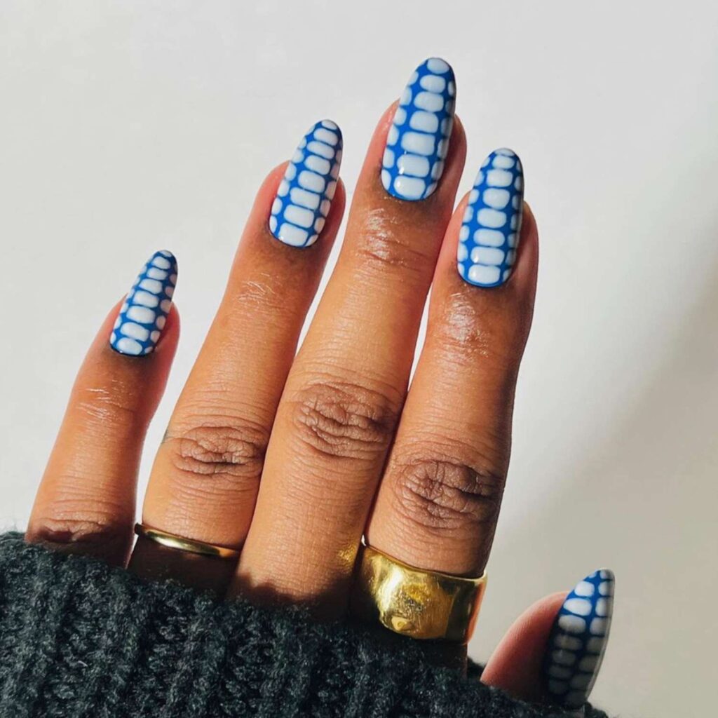 Blue and white crocodile-print nails