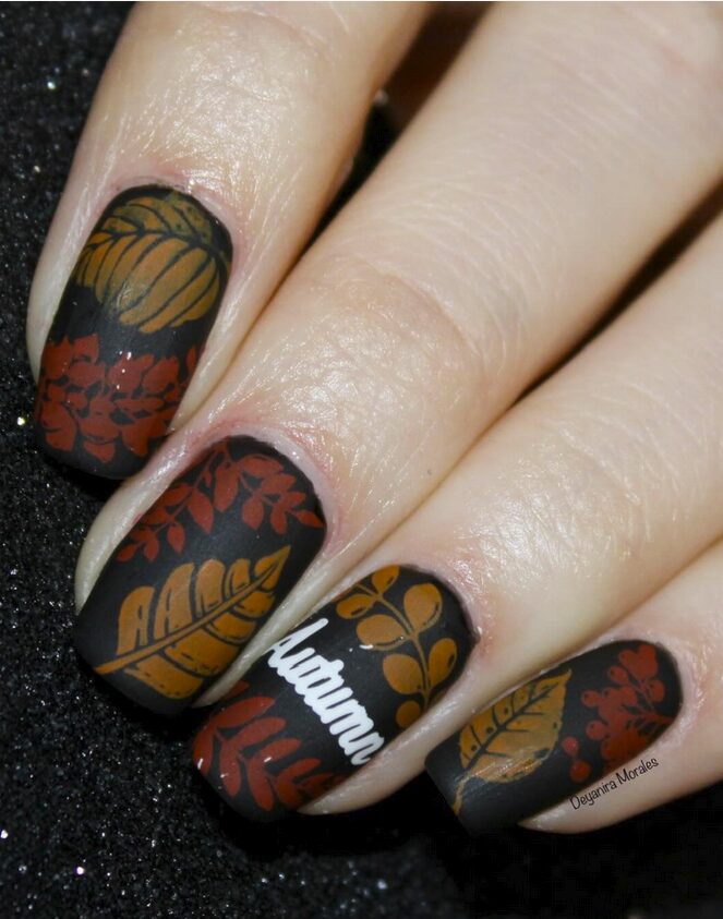 nails with brown and mustard leaf designs