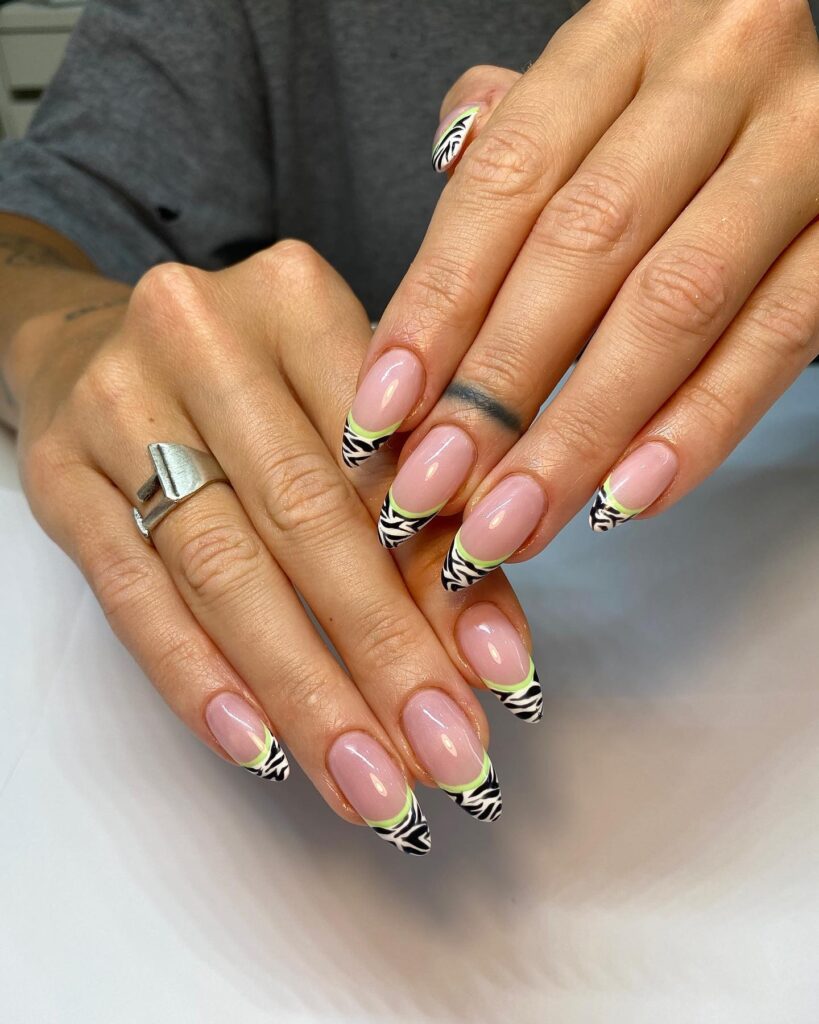 Neon lime green zebra French tip nails