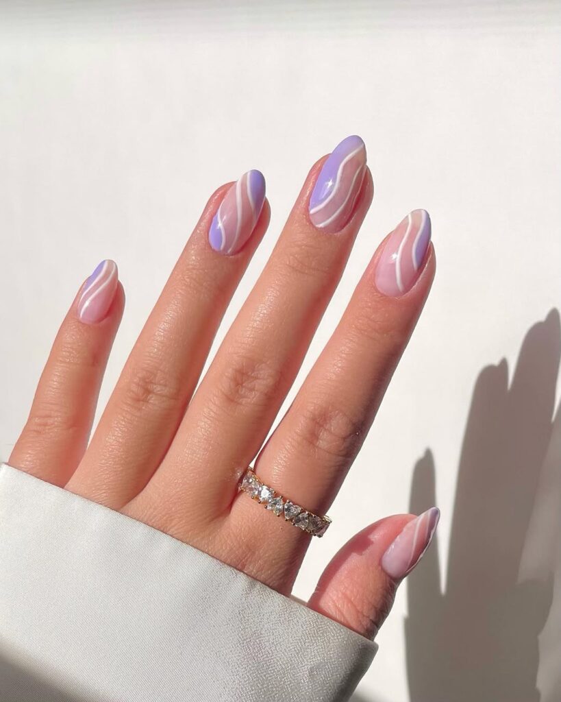 lilac purple and white swirl nail design