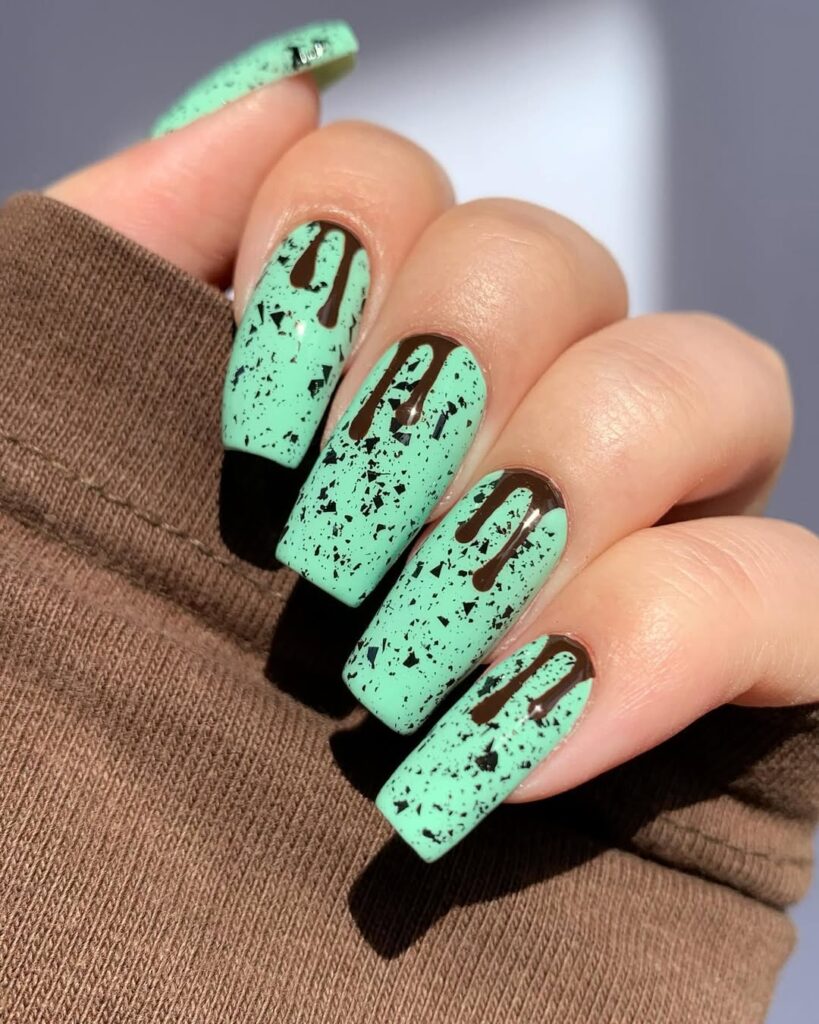Mint green nails with chocolate brown accent