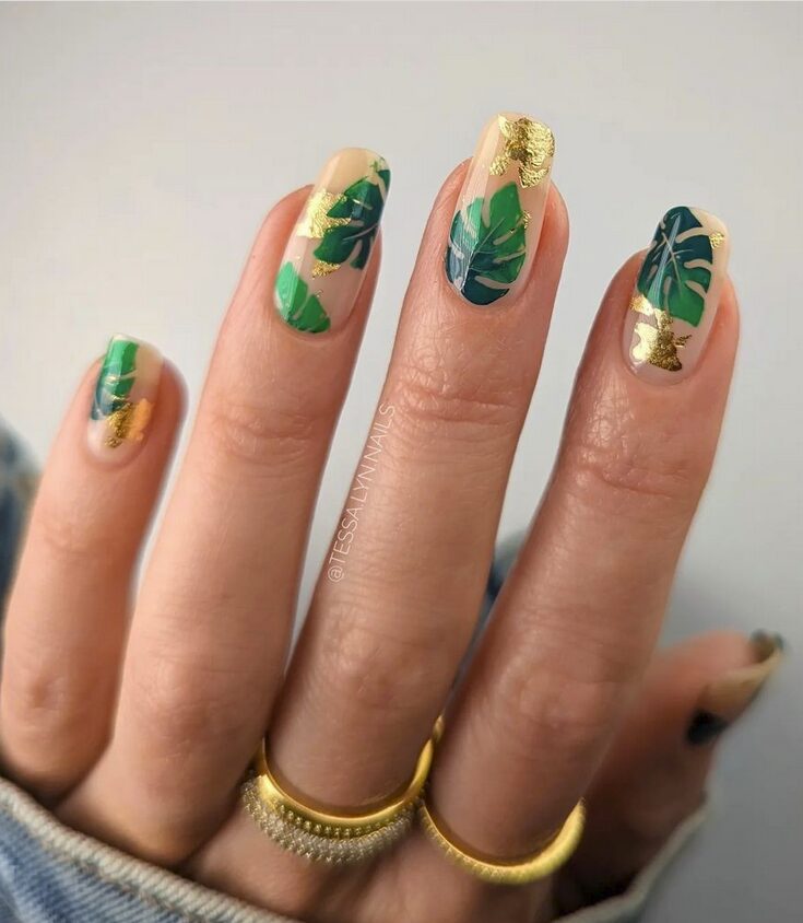Nude nails with green monstera leaf designs