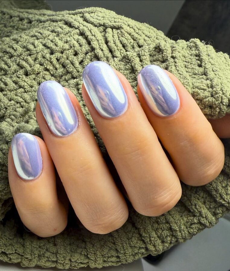 Periwinkle chrome nails with a glossy mirror finish