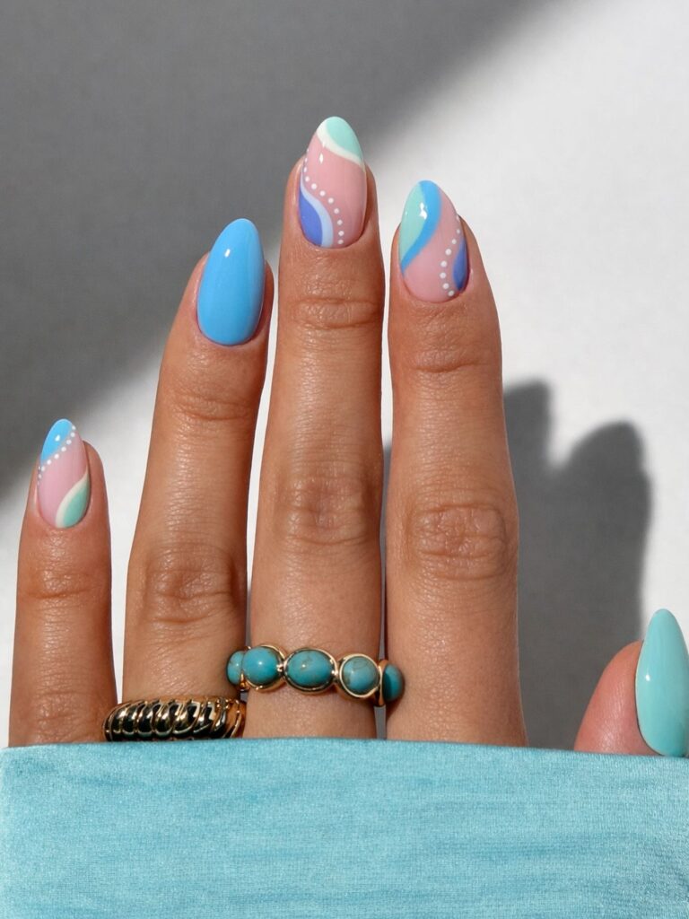 coastal blue nails with swirls